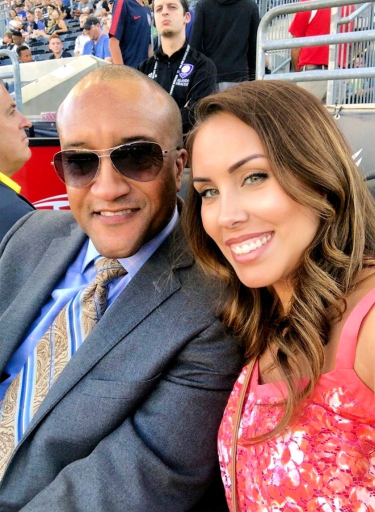 Vincent Moss, MD and his wife Leslie watch a soccer game